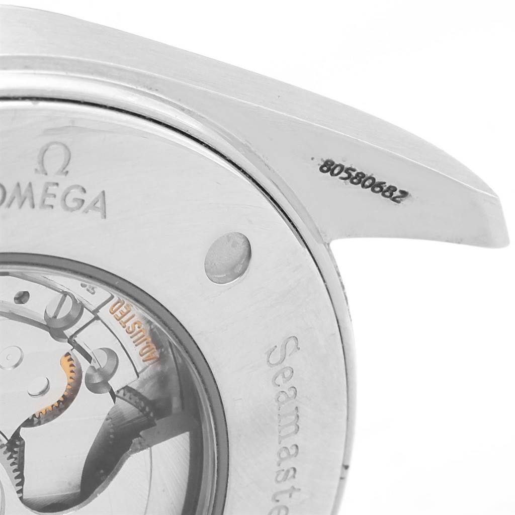 The image shows a close-up of the back casing and part of the movement of the Omega Aqua Terra 2502.33.00 Men's Stainless Steel White Dial 2502.33.00 Men's Stainless Steel White Dial watch, including the serial number.