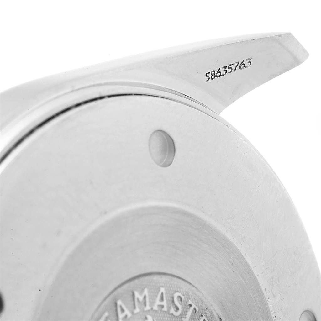 The image shows a close-up of the casing and serial number part of an Omega Aqua Terra 2317.30.00 Men
s Steel and Gold (two tone) Silver Dial 2317.30.00 Men
s Steel and Gold (two tone) Silver Dial watch.