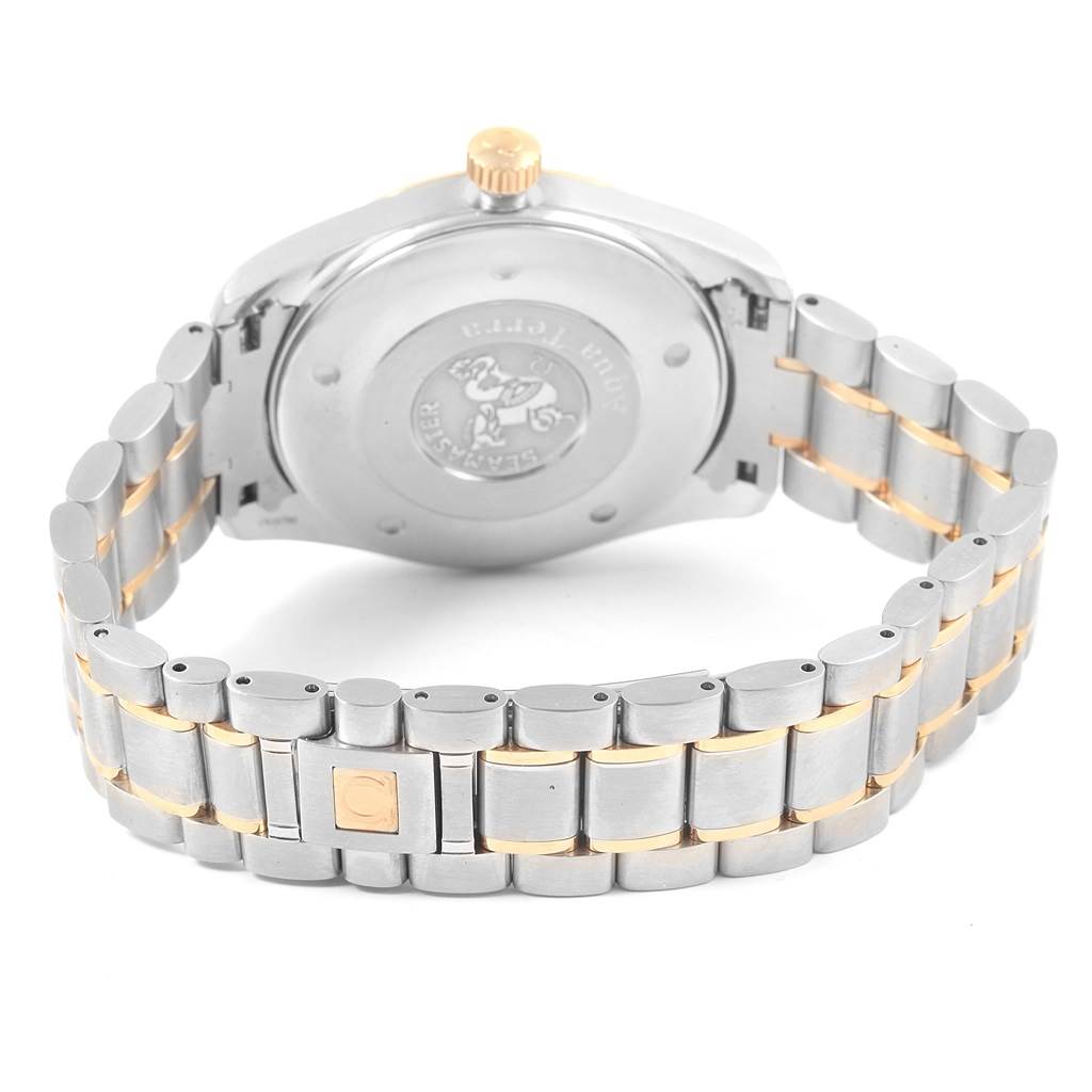 This image shows the back case and bracelet of an Omega Aqua Terra 2317.30.00 Men
s Steel and Gold (two tone) Silver Dial 2317.30.00 Men
s Steel and Gold (two tone) Silver Dial watch from an angled rear view.
