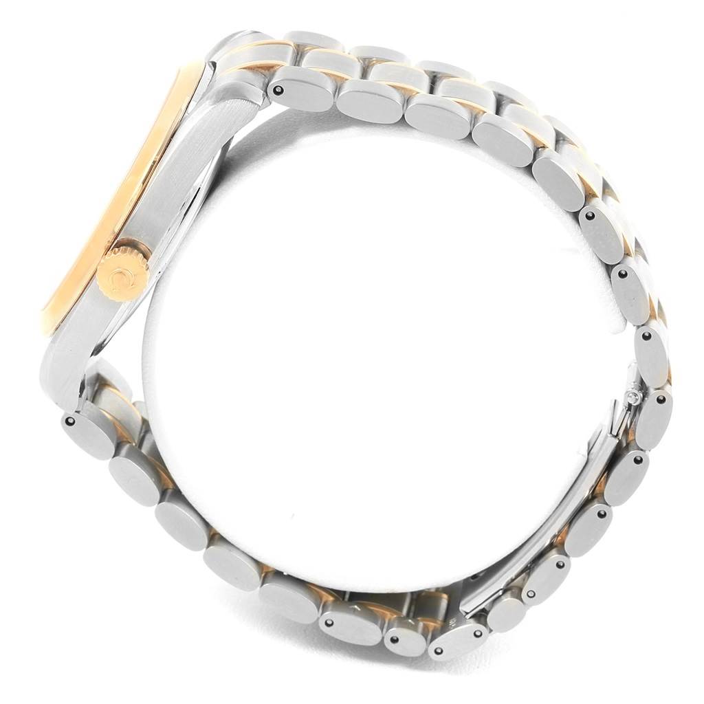 The image shows the Omega Aqua Terra 2317.30.00 Men
s Steel and Gold (two tone) Silver Dial 2317.30.00 Men
s Steel and Gold (two tone) Silver Dial watch from a side angle, highlighting the crown and bracelet.