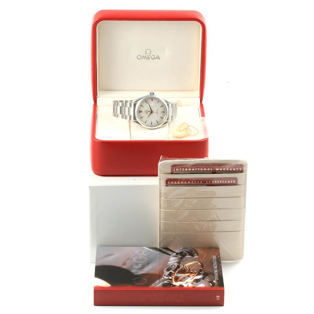 The Omega Aqua Terra 2502.34.00 Men
s Stainless Steel Silver Dial 2502.34.00 Men
s Stainless Steel Silver Dial watch is shown in its box, accompanied by an international warranty card and a manual.