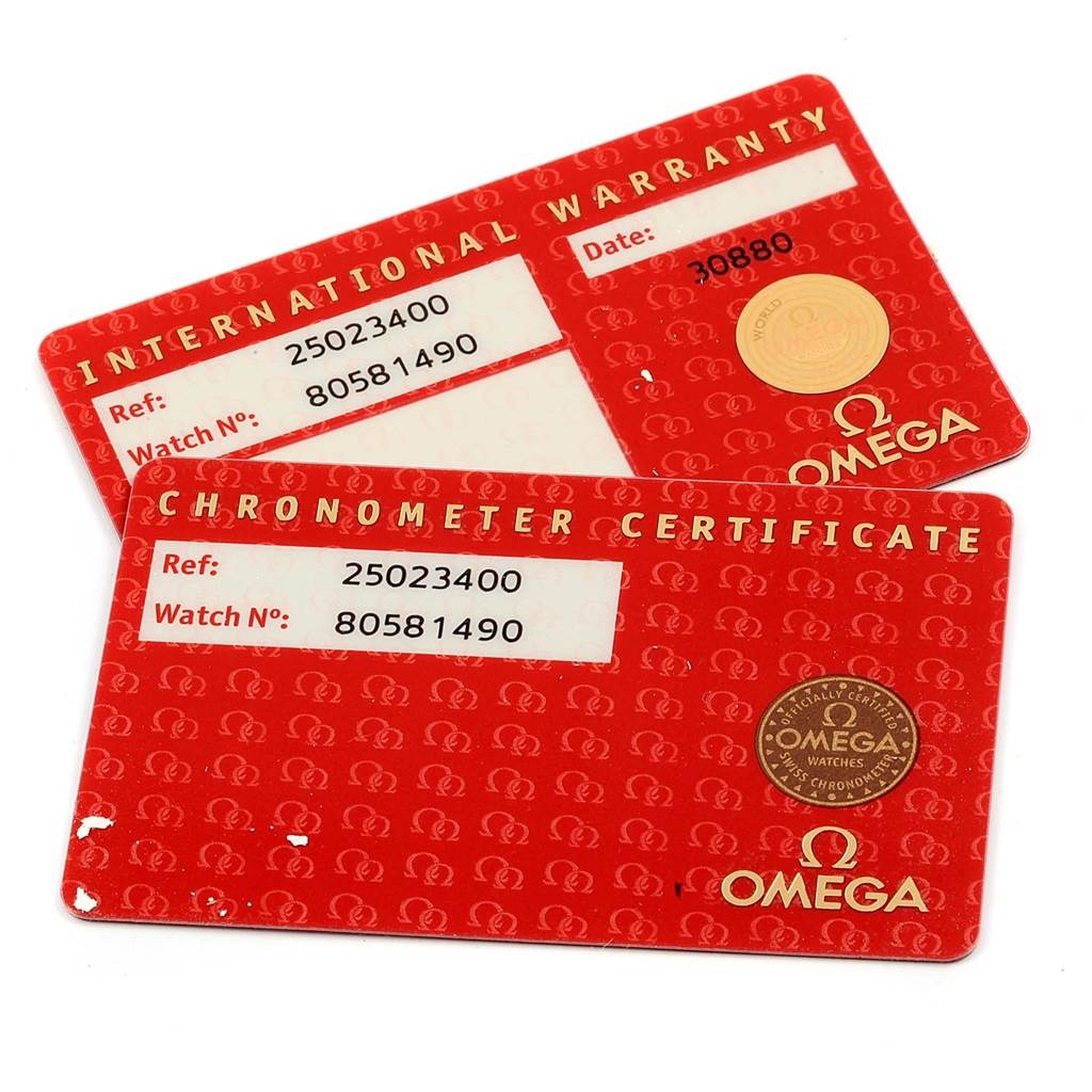 The image shows two red Omega cards for the Aqua Terra model, displaying warranty and chronometer certification details.