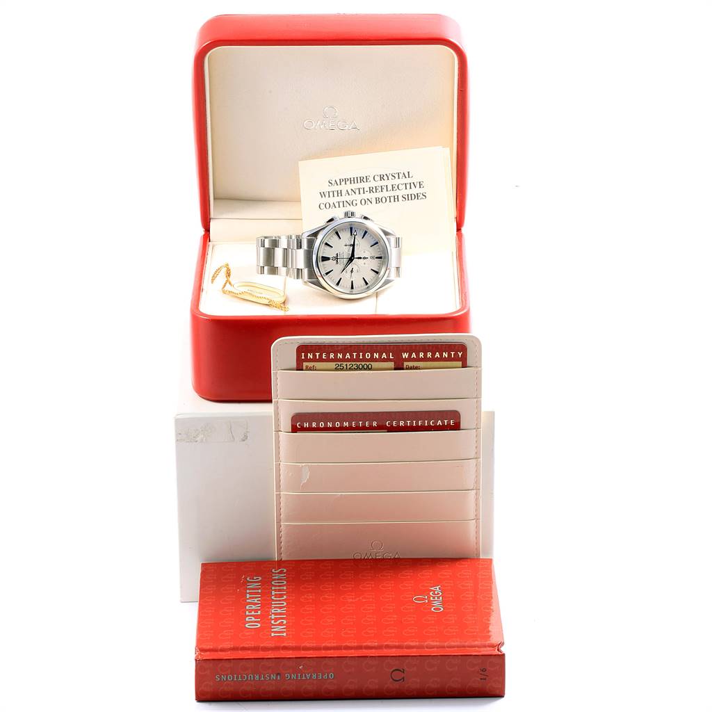 The Omega Aqua Terra 2512.30.00 Men
s Stainless Steel Silver Dial 2512.30.00 Men
s Stainless Steel Silver Dial watch is displayed in a red box, surrounded by warranty cards, a chronometer certificate, and operating instructions.