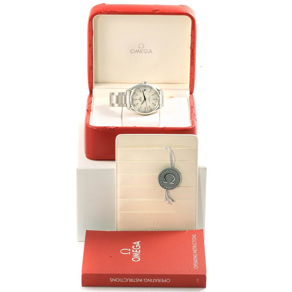 The image shows an Omega Aqua Terra 231.10.42.21.02.001 Men
s Stainless Steel Silver Dial 231.10.42.21.02.001 Men
s Stainless Steel Silver Dial watch in its box, with an instruction manual and a certification card displayed.