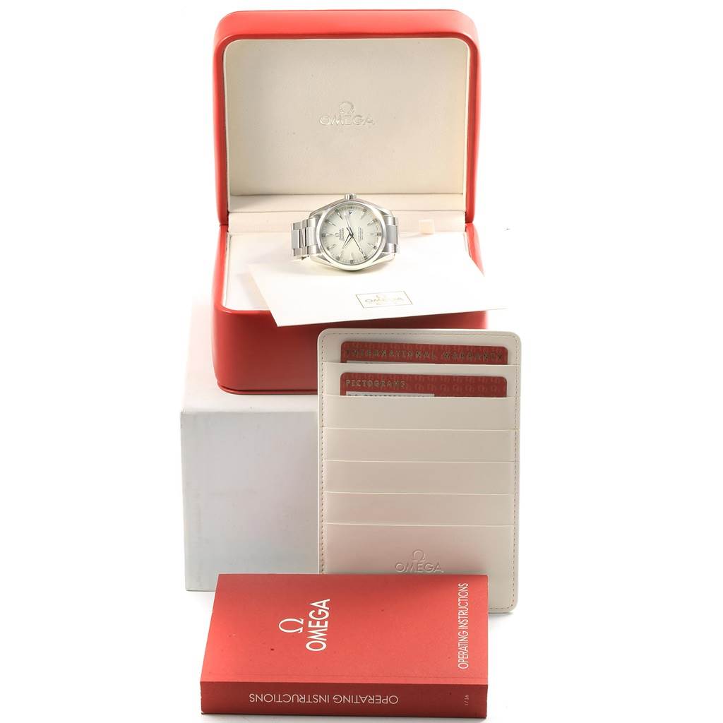 The Omega Aqua Terra 231.10.39.21.02.001 Men
s Stainless Steel Silver Dial 231.10.39.21.02.001 Men
s Stainless Steel Silver Dial watch is shown from a front angle, placed in its open box, along with its operating instructions and cards.