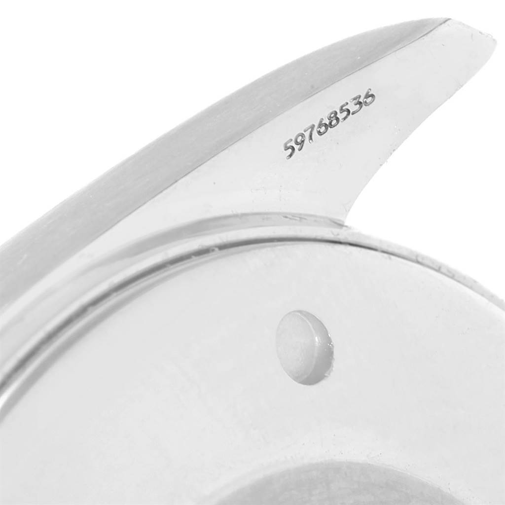 This close-up image shows the serial number engraving on the lug of the Omega Aqua Terra 2317.30.00 Steel and Gold (two tone) Silver Dial 2317.30.00 Steel and Gold (two tone) Silver Dial watch.