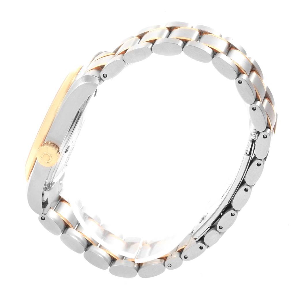 This image shows the side view of the Omega Aqua Terra 2318.30.00 Men
s Steel and Gold (two tone) Silver Dial 2318.30.00 Men
s Steel and Gold (two tone) Silver Dial watch, focusing on its case, crown, and bracelet.