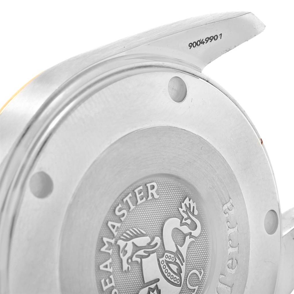 The image shows the engraved case back and lugs of an Omega Aqua Terra 2318.30.00 Men
s Steel and Gold (two tone) Silver Dial 2318.30.00 Men
s Steel and Gold (two tone) Silver Dial watch at an oblique angle.