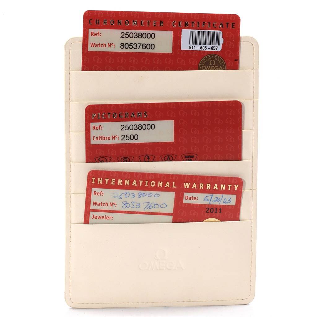 The image shows the documentation for an Omega Aqua Terra 2503.80.00 Men's Stainless Steel Blue Dial 2503.80.00 Men's Stainless Steel Blue Dial watch, including the chronometer certificate, pictograms, and international warranty card.