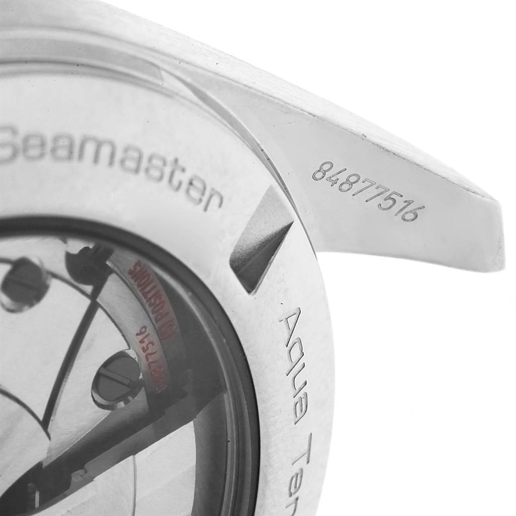 The image shows a close-up of the casing, bezel, and serial number on an Omega Aqua Terra 231.10.39.21.06.001 Men's Stainless Steel Grey Dial 231.10.39.21.06.001 Men's Stainless Steel Grey Dial watch, specifically highlighting parts of the back and side.