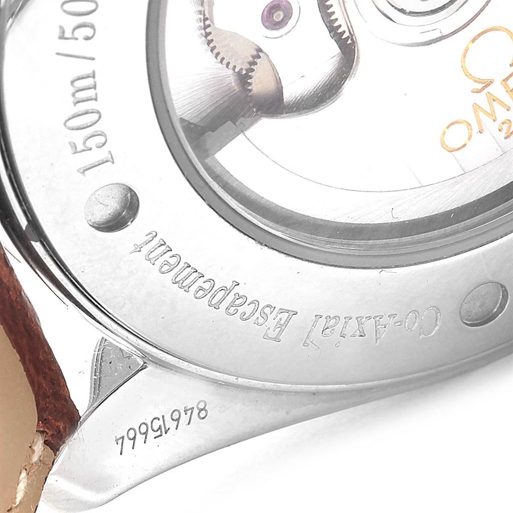 This image shows the back of an Omega Aqua Terra 2803.52.37 Men's Stainless Steel Black Dial 2803.52.37 Men's Stainless Steel Black Dial watch, highlighting the co-axial escapement and part of its leather strap.