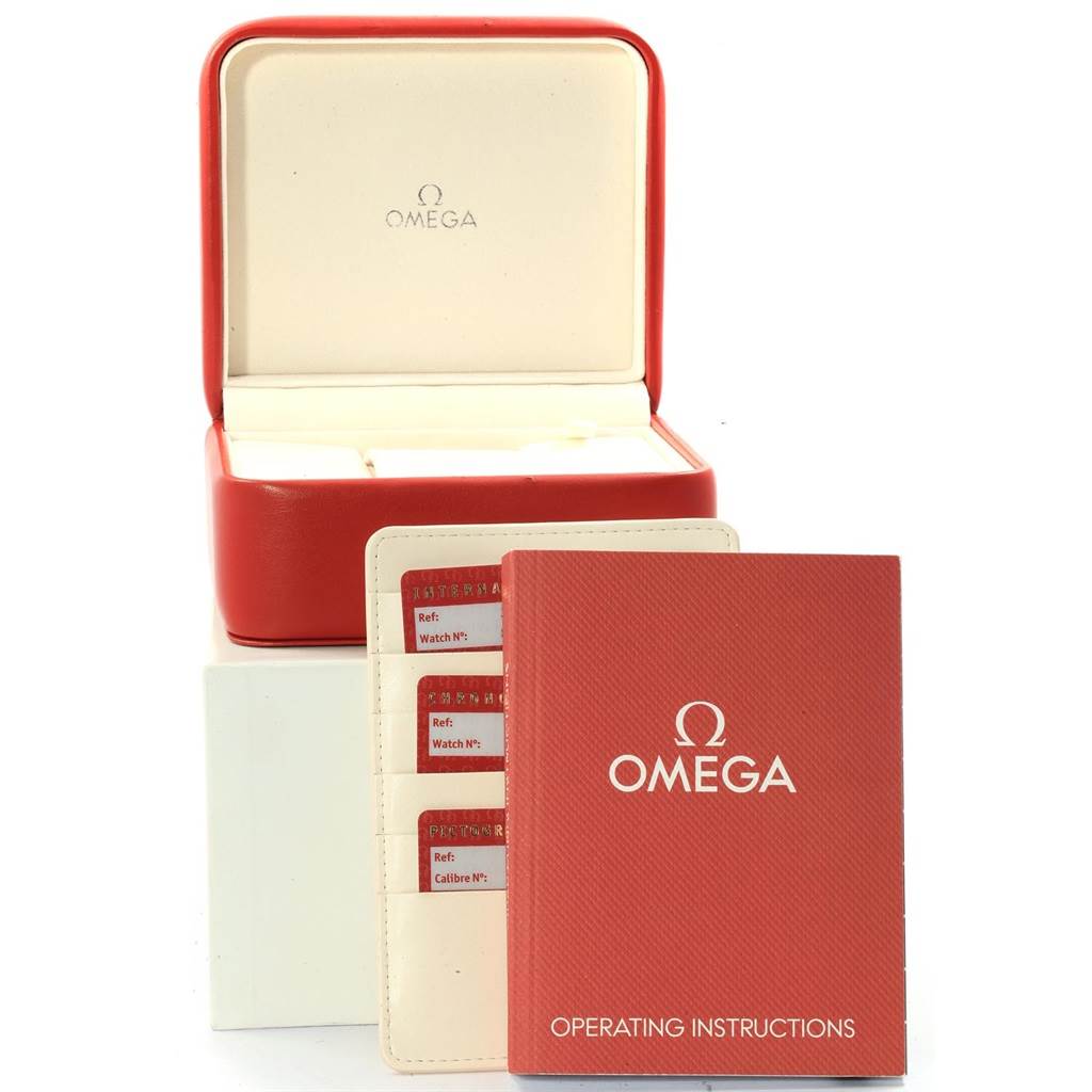 The image shows an Omega Aqua Terra 2503.34.00 Men
s Stainless Steel Silver Dial 2503.34.00 Men
s Stainless Steel Silver Dial watch box, operating instructions, and warranty cards from a front angle.