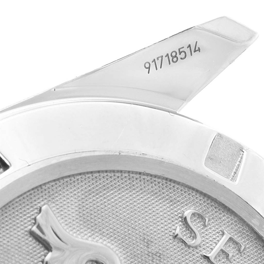 This image shows a close-up of the case back and serial number of an Omega Aqua Terra 231.10.39.60.06.001 Men's Stainless Steel Grey Dial 231.10.39.60.06.001 Men's Stainless Steel Grey Dial watch.