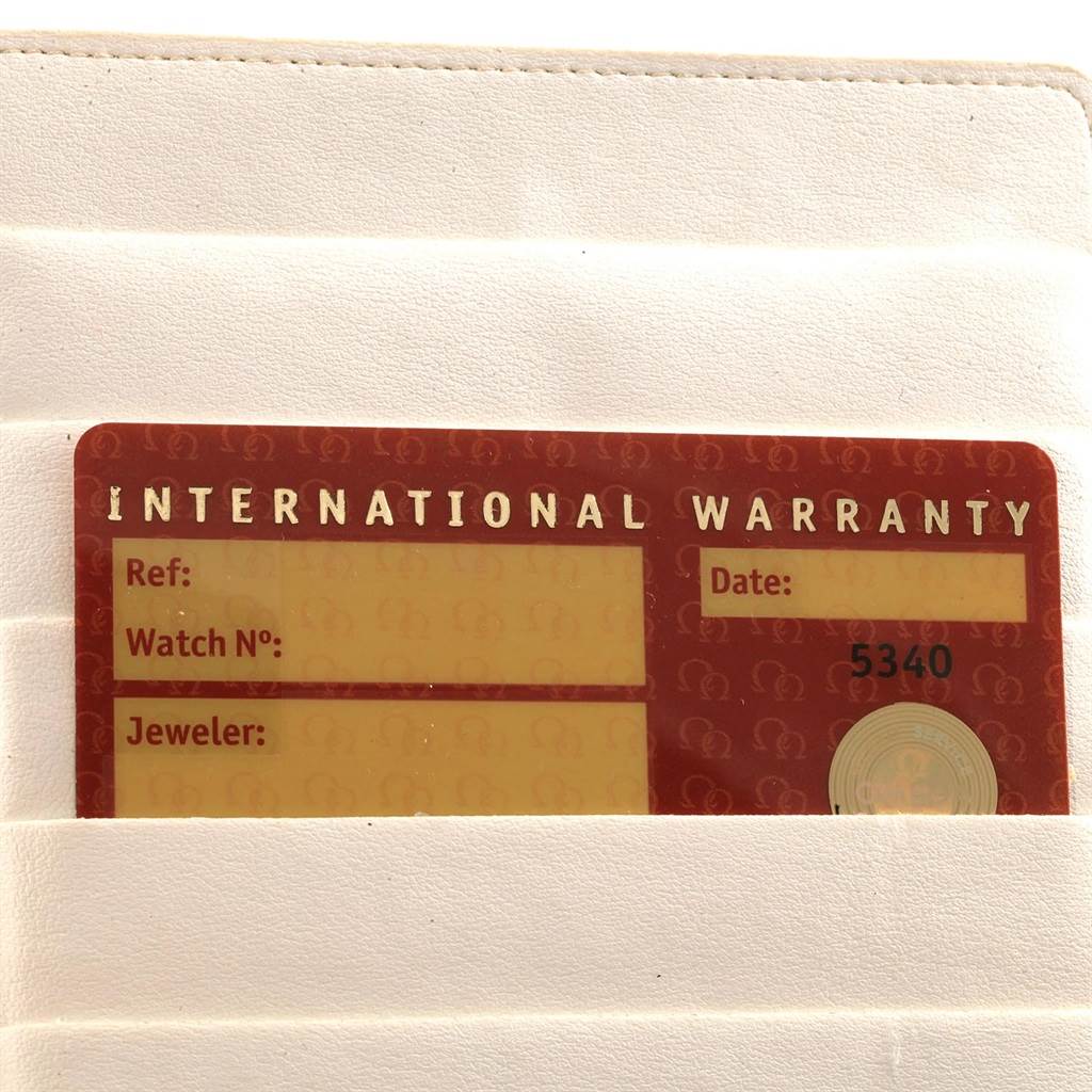 This image shows the international warranty card of an Omega Aqua Terra 2503.80.00 Men's Stainless Steel Blue Dial 2503.80.00 Men's Stainless Steel Blue Dial model watch inserted into a white holder.