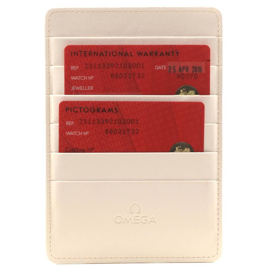 The image shows an Omega Aqua Terra 231.13.39.21.03.001 Men's Stainless Steel Blue Dial 231.13.39.21.03.001 Men's Stainless Steel Blue Dial watch's warranty cards in a white cardholder.