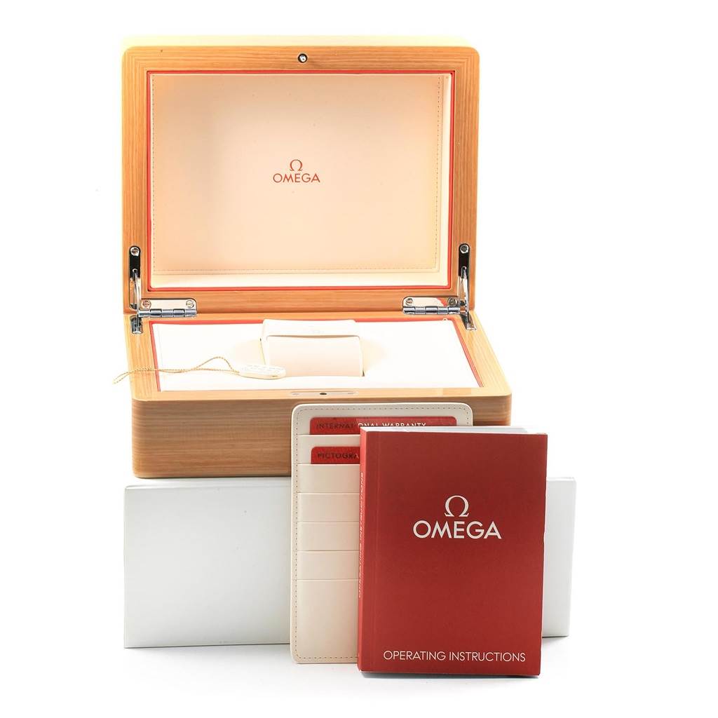 The image shows the packaging, operating instructions, and warranty card for the Omega Aqua Terra 231.13.39.21.03.001 Men's Stainless Steel Blue Dial 231.13.39.21.03.001 Men's Stainless Steel Blue Dial watch.