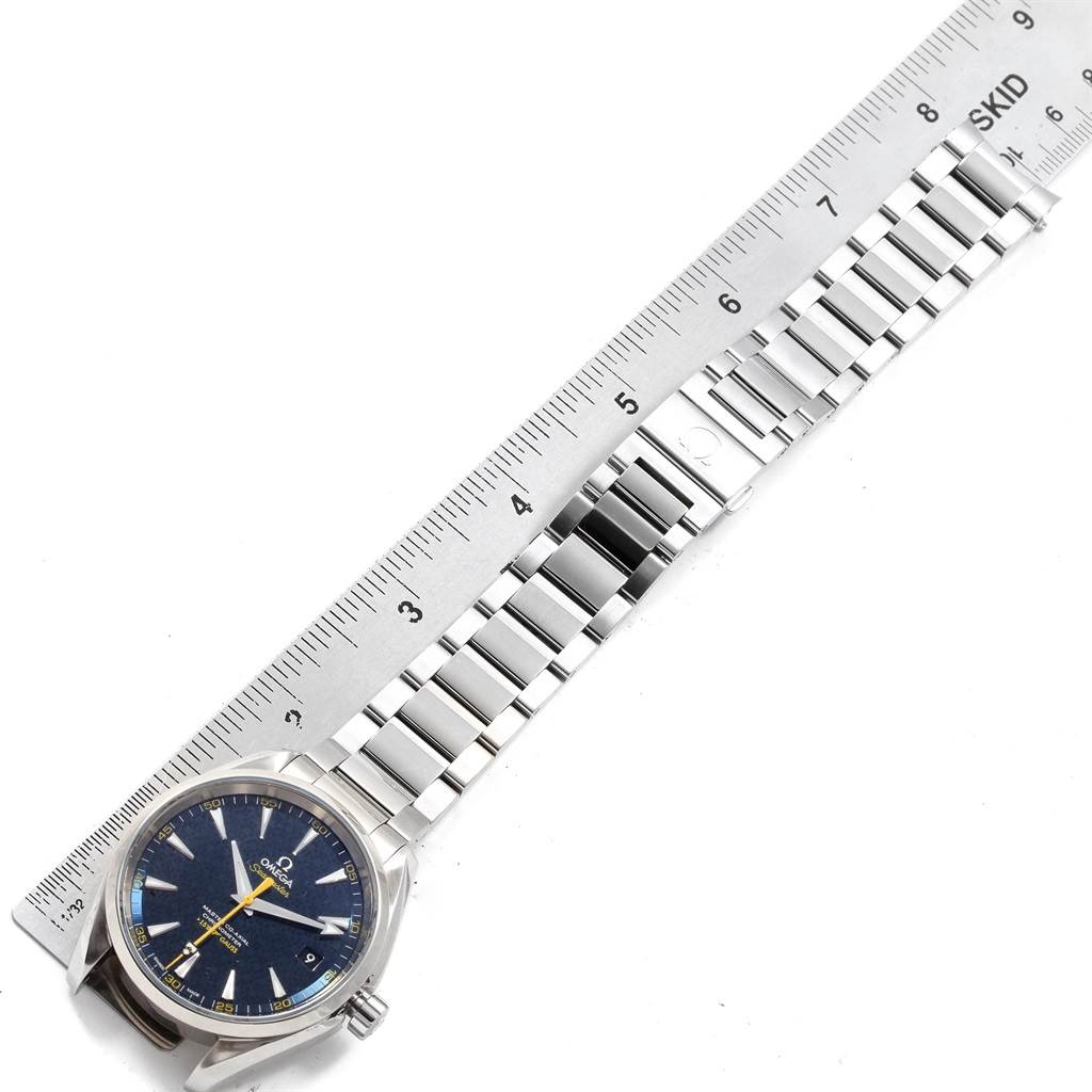 The image shows the Omega Aqua Terra 231.10.42.21.03.004 Men's Stainless Steel Blue Dial 231.10.42.21.03.004 Men's Stainless Steel Blue Dial watch placed flat next to a ruler, displaying the watch face, case, and entire bracelet.