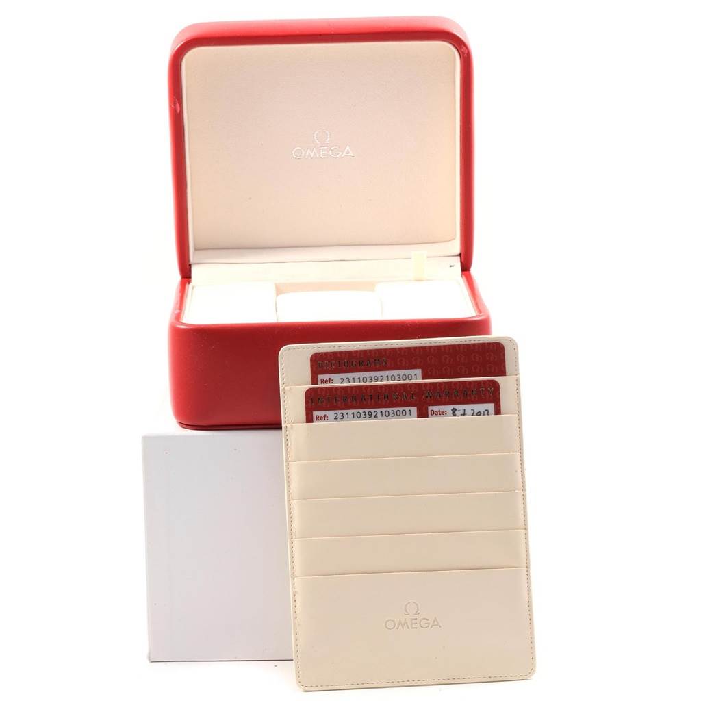 The image shows the Omega Aqua Terra 231.10.39.21.03.001 Men
s Stainless Steel Blue Dial 231.10.39.21.03.001 Men
s Stainless Steel Blue Dial watch box and cardholder with cards from a front angle.