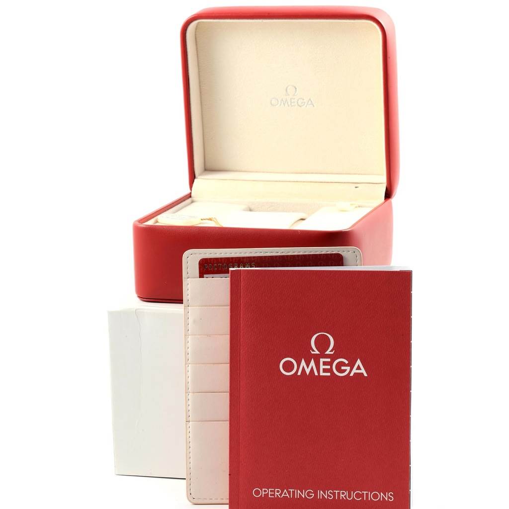 The image shows an open Omega Aqua Terra 231.10.42.21.06.001 Men's Stainless Steel Grey Dial 231.10.42.21.06.001 Men's Stainless Steel Grey Dial watch box with the brand's operating instructions booklet in front.