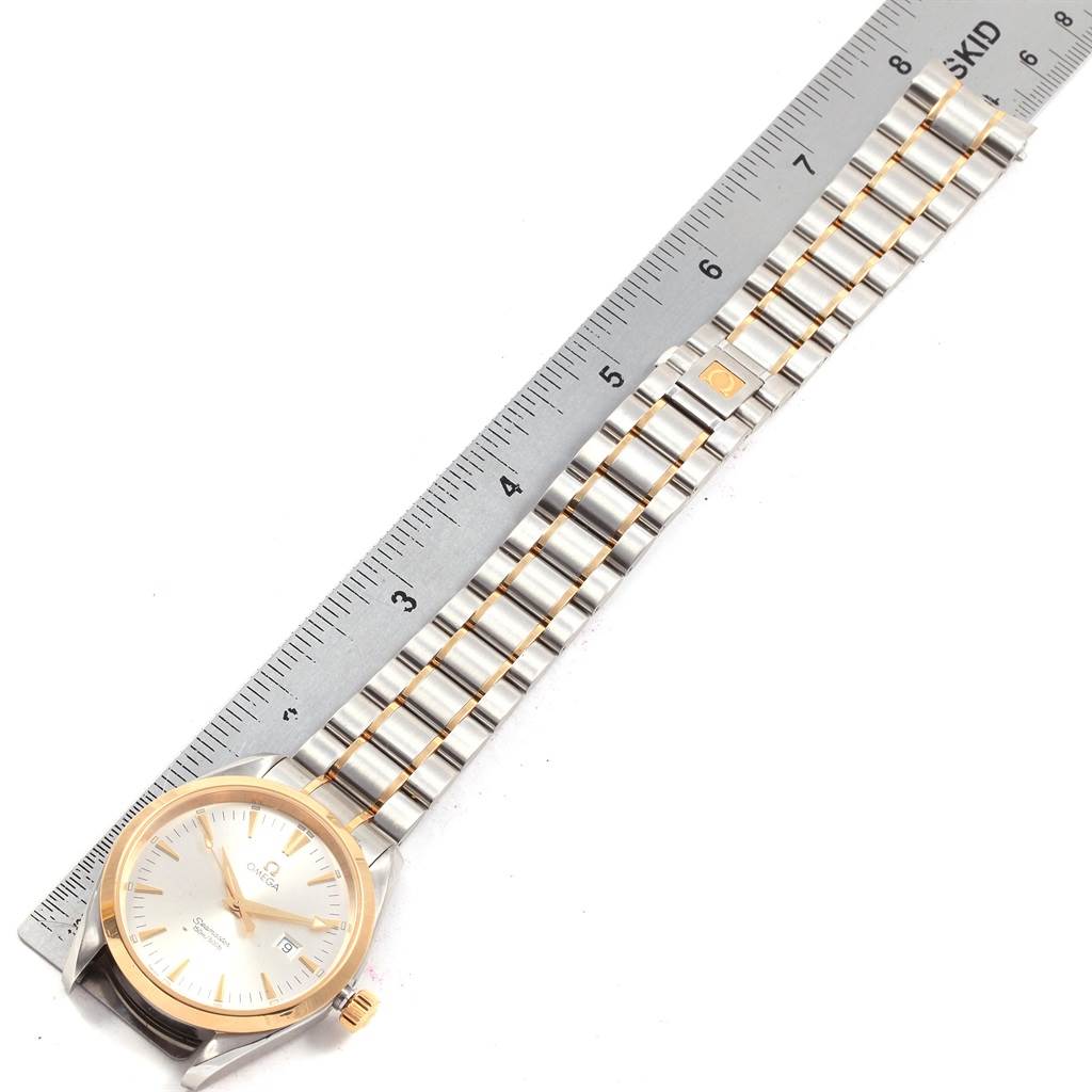 The Omega Aqua Terra 2317.30.00 Men's Steel and Gold (two tone) Silver Dial 2317.30.00 Men's Steel and Gold (two tone) Silver Dial watch is shown from a top-down angle, featuring its face, bezel, and metal bracelet.