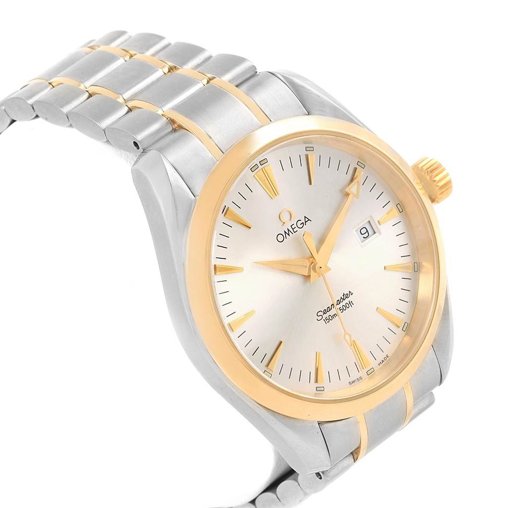 The image shows an angled view of the Omega Aqua Terra 2317.30.00 Men's Steel and Gold (two tone) Silver Dial 2317.30.00 Men's Steel and Gold (two tone) Silver Dial watch, highlighting its face, bezel, crown, and part of the bracelet.