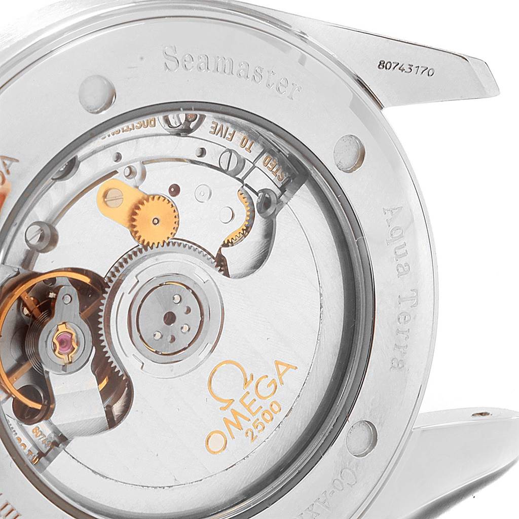 This image shows a close-up view of the Omega Aqua Terra 2503.34.00 Men
s Stainless Steel Silver Dial 2503.34.00 Men
s Stainless Steel Silver Dial watch
s intricate movement and inner mechanism.