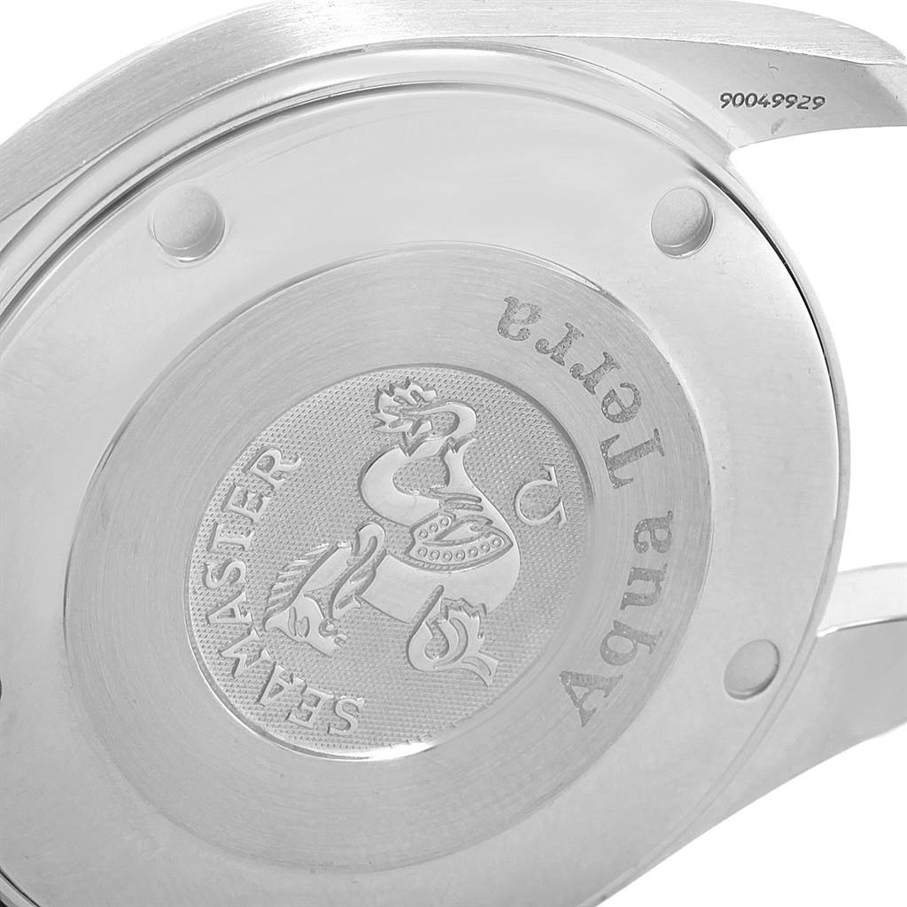 The image shows the back case and part of the lugs of an Aqua Terra model by Omega, with engraved details.