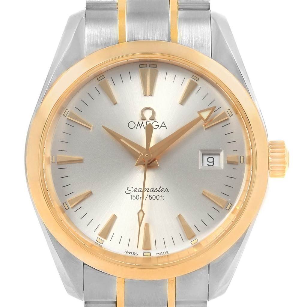 The image shows a close-up of an Omega Aqua Terra 2318.30.00 Men
s Steel and Gold (two tone) Silver Dial 2318.30.00 Men
s Steel and Gold (two tone) Silver Dial Seamaster watch, highlighting the dial, hands, bezel, and part of the bracelet.