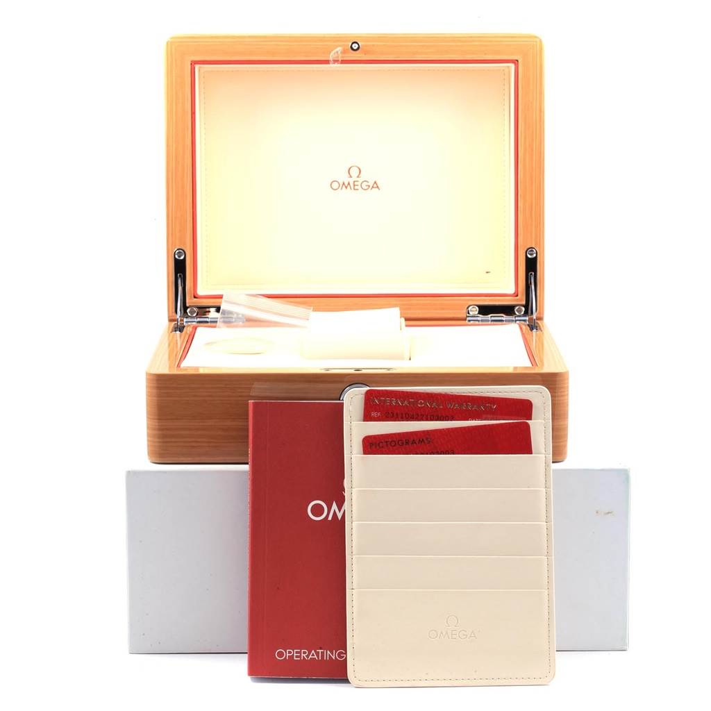 The image shows an open Omega Aqua Terra 231.10.42.21.03.003 Men
s Stainless Steel Blue Dial 231.10.42.21.03.003 Men
s Stainless Steel Blue Dial watch box with service booklets and warranty cards.