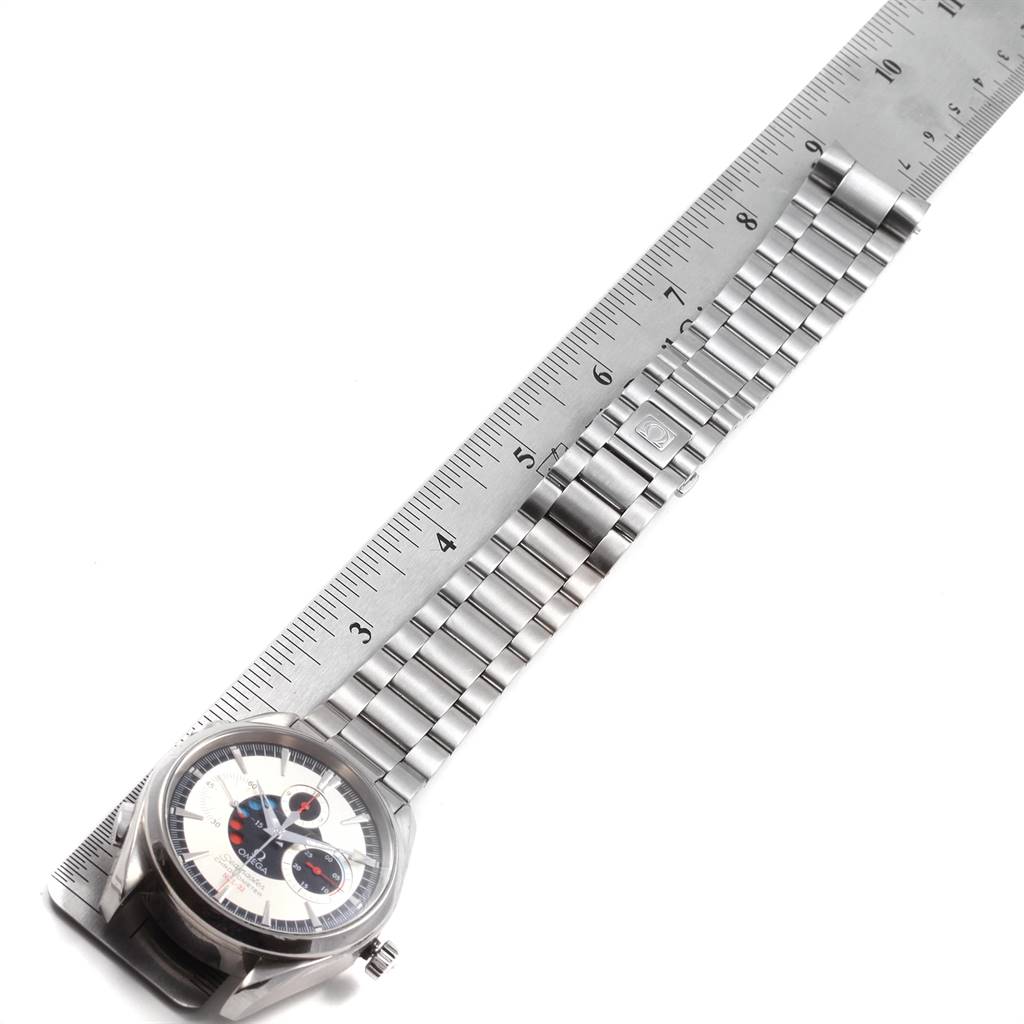 The image shows an Omega Aqua Terra 2513.30.00 Men
s Stainless Steel Silver Dial 2513.30.00 Men
s Stainless Steel Silver Dial watch laid out flat, with a ruler measuring its metal strap.