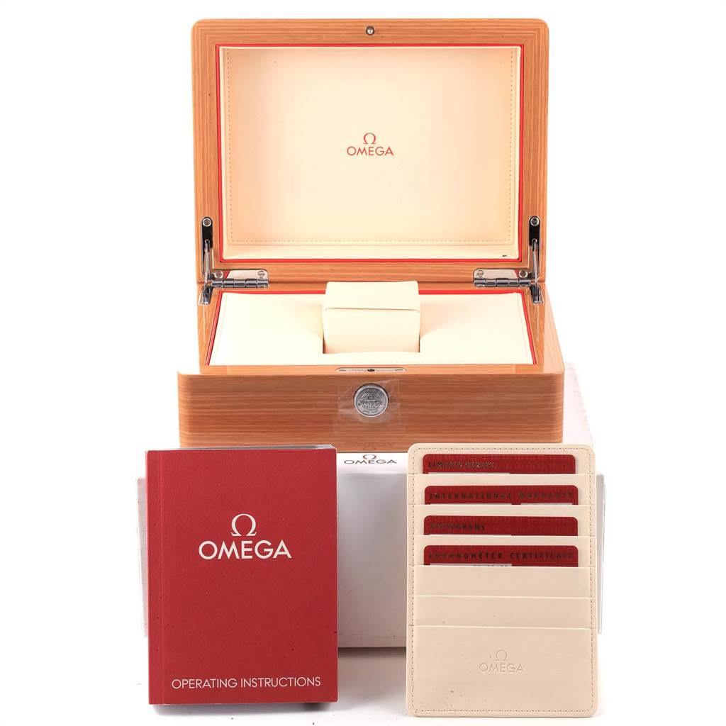 The image shows an open Omega Aqua Terra 2512.54.00 Men's Stainless Steel Black Dial 2512.54.00 Men's Stainless Steel Black Dial watch box with an instruction manual and warranty cards displayed in front.