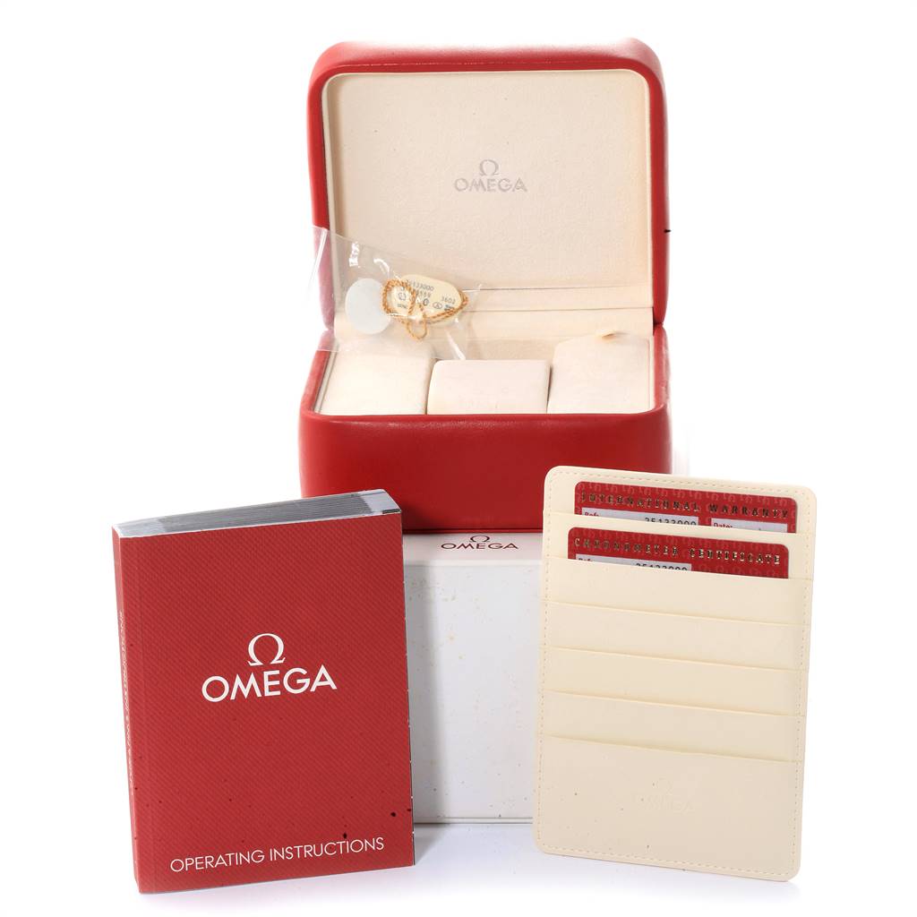 The image shows the packaging of an Omega Aqua Terra 2513.30.00 Men's Stainless Steel Silver Dial 2513.30.00 Men's Stainless Steel Silver Dial watch, including the box, operating instructions, and warranty cards.
