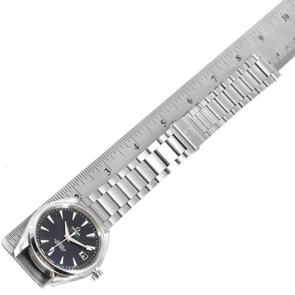 The Omega Aqua Terra 231.10.42.21.01.001 Men's Stainless Steel Black Dial 231.10.42.21.01.001 Men's Stainless Steel Black Dial watch is shown from a top-down angle alongside a measuring ruler.