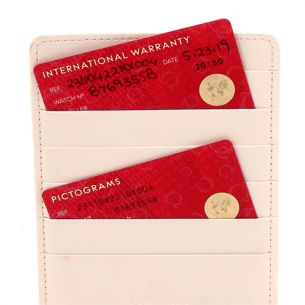 This image shows warranty and pictogram cards for the Omega Aqua Terra 231.10.42.21.01.004 Men
s Stainless Steel Black Dial 231.10.42.21.01.004 Men
s Stainless Steel Black Dial watch, placed in a holder.