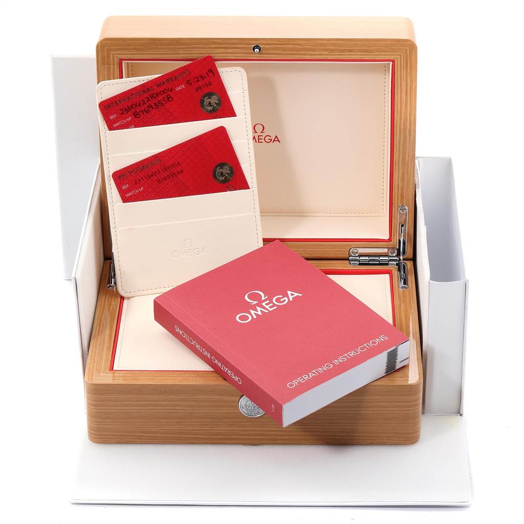 The image shows the packaging box of the Omega Aqua Terra 231.10.42.21.01.004 Men
s Stainless Steel Black Dial 231.10.42.21.01.004 Men
s Stainless Steel Black Dial watch, including the operating instructions and warranty cards.