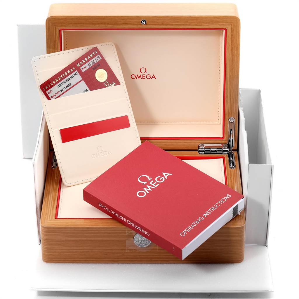 The image shows the packaging for the Omega Aqua Terra 231.10.42.21.01.002 Men
s Stainless Steel Black Dial 231.10.42.21.01.002 Men
s Stainless Steel Black Dial, including the warranty card, instruction manual, and watch box.