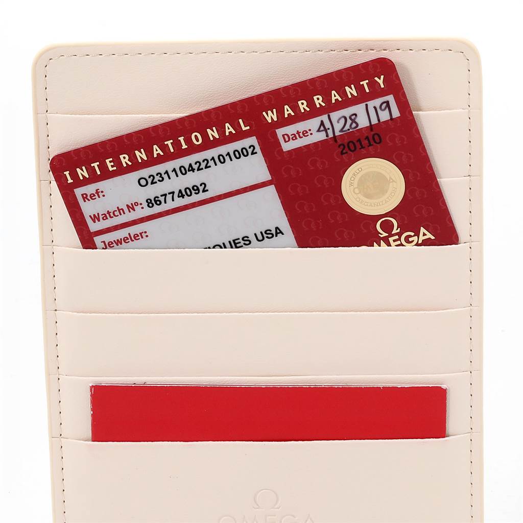 The image shows the international warranty card for an Omega Aqua Terra 231.10.42.21.01.002 Men
s Stainless Steel Black Dial 231.10.42.21.01.002 Men
s Stainless Steel Black Dial watch, partially visible in a white cardholder.