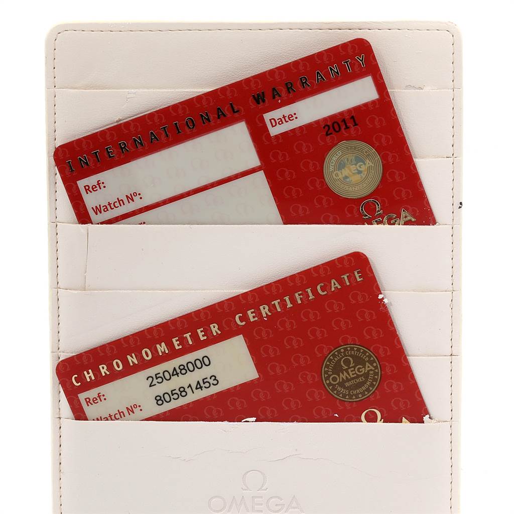 The image shows the International Warranty and Chronometer Certificate cards for the Omega Aqua Terra 2504.80.00 Men
s Stainless Steel Blue Dial 2504.80.00 Men
s Stainless Steel Blue Dial watch, inside a white cardholder.