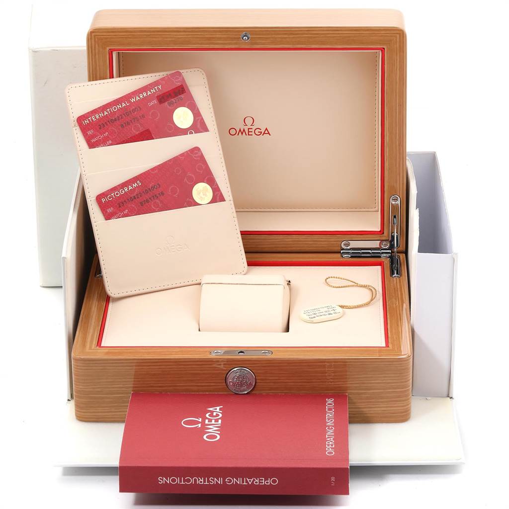 The image shows the packaging and accessories of the Omega Aqua Terra 231.10.42.21.01.003 Men
s Stainless Steel Black Dial 231.10.42.21.01.003 Men
s Stainless Steel Black Dial watch, including the box, manuals, warranty cards, and tags.