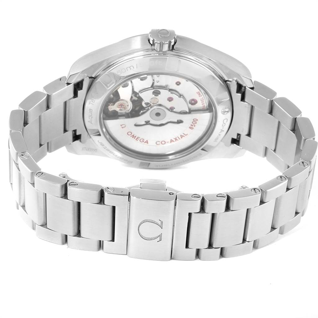 The image shows the back view of the Omega Aqua Terra 231.10.39.21.02.001 Men
s Stainless Steel Silver Dial 231.10.39.21.02.001 Men
s Stainless Steel Silver Dial watch highlighting its Co-Axial 8500 movement and metal bracelet.