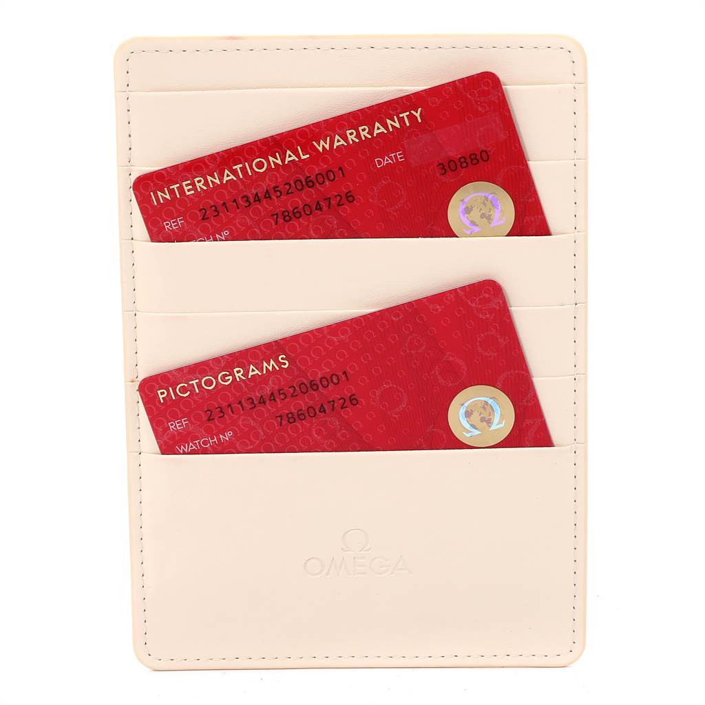 The image shows the international warranty and pictograms cards for the Omega Aqua Terra 231.13.44.52.06.001 Men's Stainless Steel Grey Dial 231.13.44.52.06.001 Men's Stainless Steel Grey Dial model, displayed in a cream card holder.