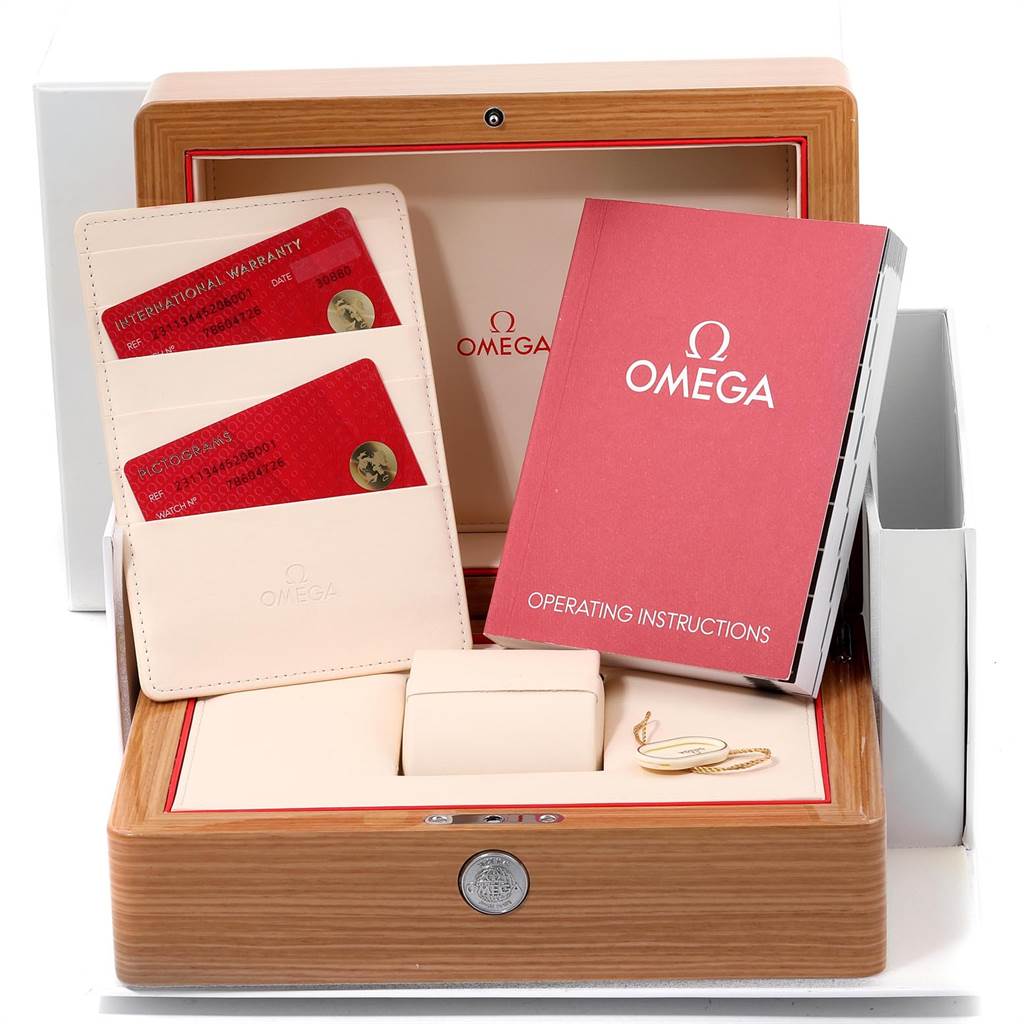 The image shows the box and accessories for an Omega Aqua Terra 231.13.44.52.06.001 Men's Stainless Steel Grey Dial 231.13.44.52.06.001 Men's Stainless Steel Grey Dial watch, including international warranty cards, operating instructions, and a wooden case.