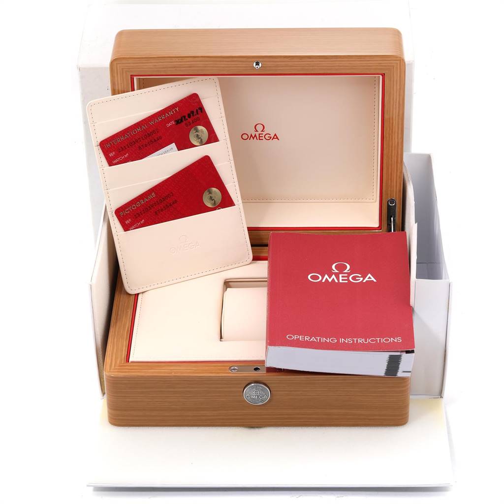 The image shows the packaging, warranty card, and instruction manual for the Omega Aqua Terra 231.10.39.21.03.002 Men
s Stainless Steel Blue Dial 231.10.39.21.03.002 Men
s Stainless Steel Blue Dial model.