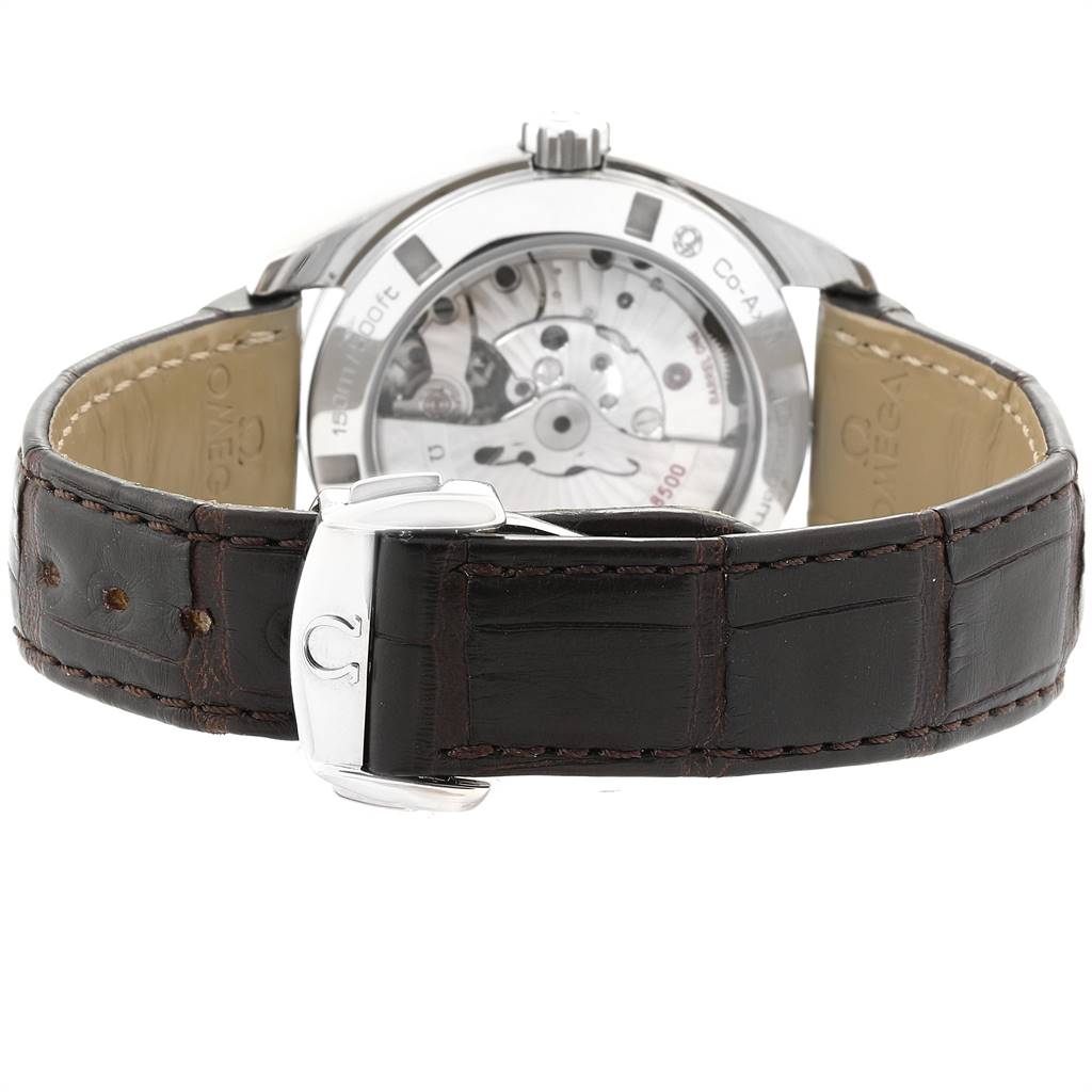 The image shows the back view of an Omega Aqua Terra 231.13.39.21.02.002 Men
s Stainless Steel Silver Dial 231.13.39.21.02.002 Men
s Stainless Steel Silver Dial watch, highlighting its open case back and leather strap with a deployant clasp.