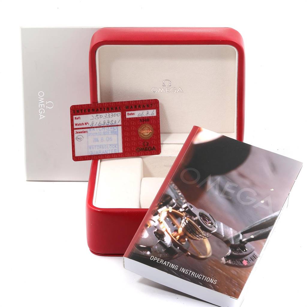 The image shows the packaging, international warranty card, and operating instructions for an Omega Aqua Terra 2503.33.00 Men
s Stainless Steel Silver Dial 2503.33.00 Men
s Stainless Steel Silver Dial watch.