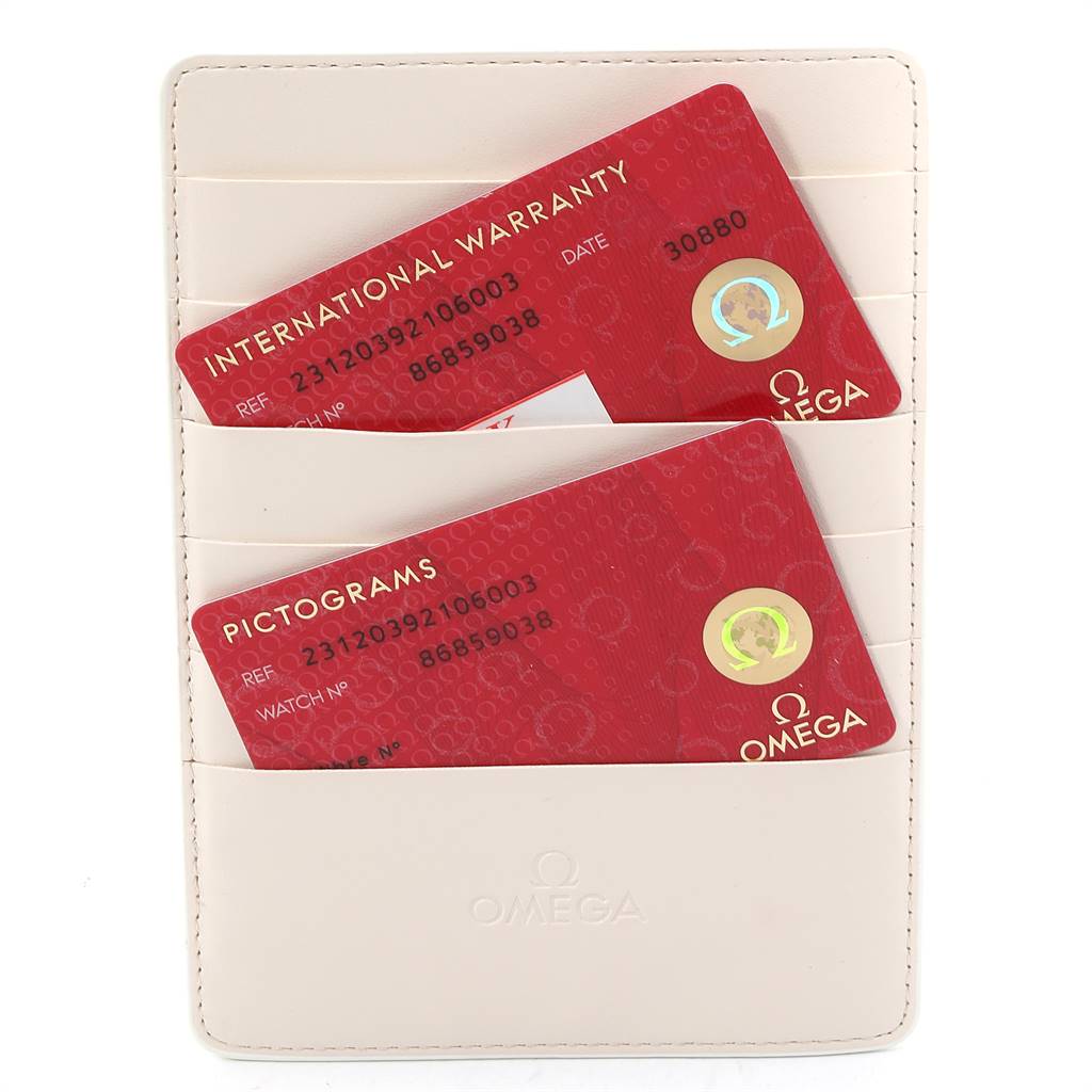 The image shows a holder with International Warranty and Pictograms cards for an Omega Aqua Terra 231.20.39.21.06.003 Men's Stainless Steel Brown Dial 231.20.39.21.06.003 Men's Stainless Steel Brown Dial model.