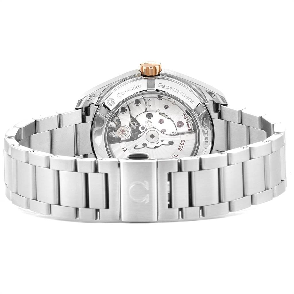 The image shows the back of the Omega Aqua Terra 231.20.39.21.06.003 Men's Stainless Steel Brown Dial 231.20.39.21.06.003 Men's Stainless Steel Brown Dial watch, highlighting its movement and metal bracelet.