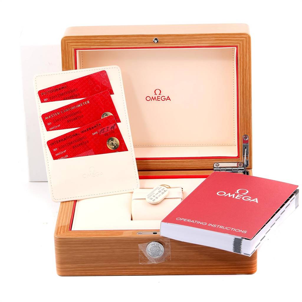 The image shows an Omega Aqua Terra 220.12.38.20.02.001 Men
s Stainless Steel Silver Dial 220.12.38.20.02.001 Men
s Stainless Steel Silver Dial model watch box, cards, tags, and operating instruction manual.