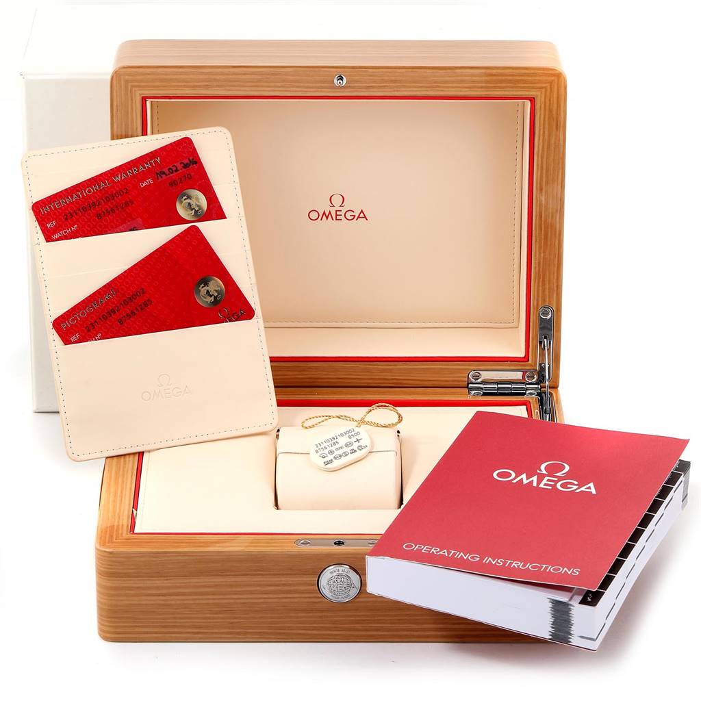 The image shows an Omega Aqua Terra 231.10.39.21.03.002 Men
s Stainless Steel Blue Dial 231.10.39.21.03.002 Men
s Stainless Steel Blue Dial watch packaging with the box, warranty cards, and operating instructions.