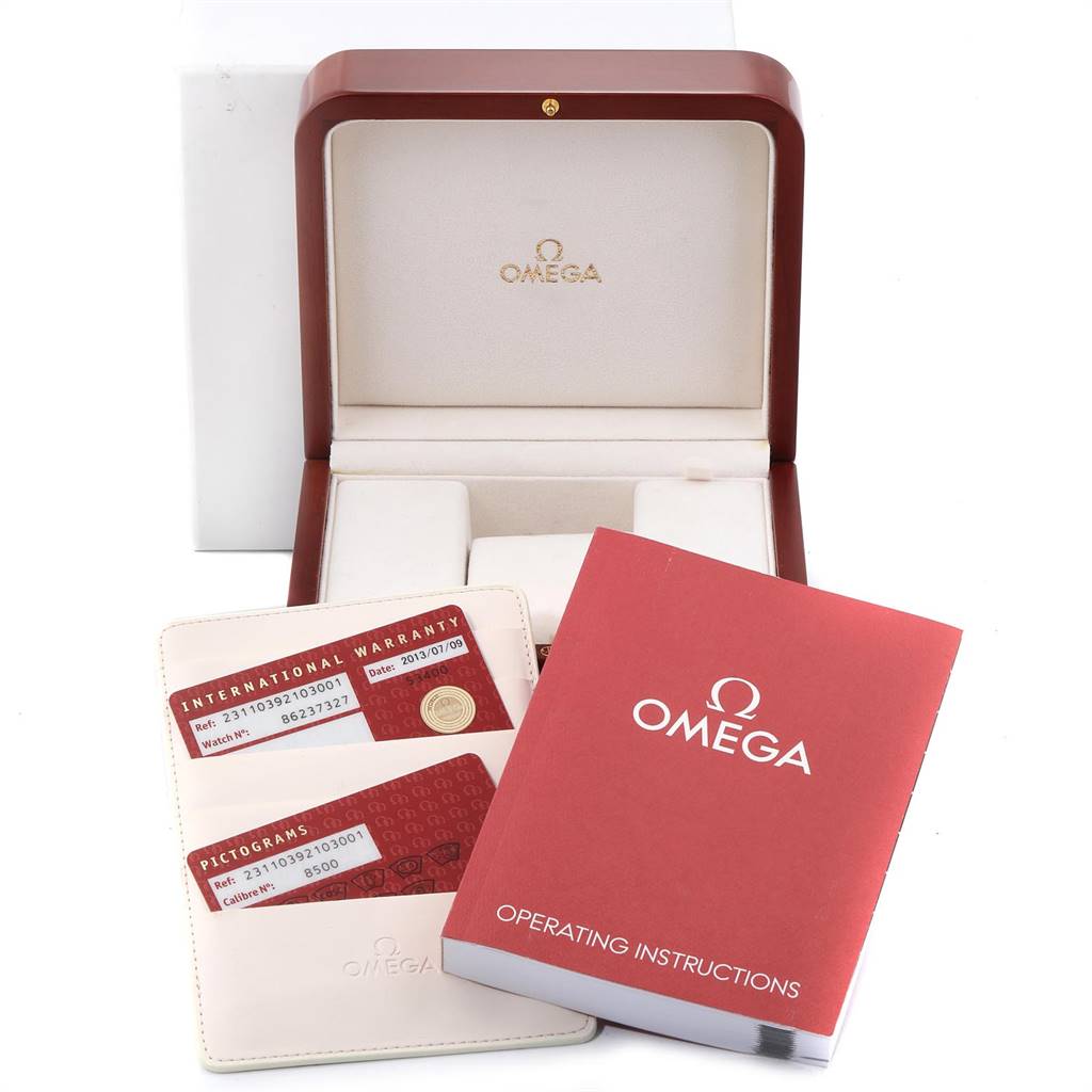 The image shows the watch box, international warranty cards, and operating instructions for an Omega Aqua Terra 231.10.39.21.03.001 Men's Stainless Steel Blue Dial 231.10.39.21.03.001 Men's Stainless Steel Blue Dial model.